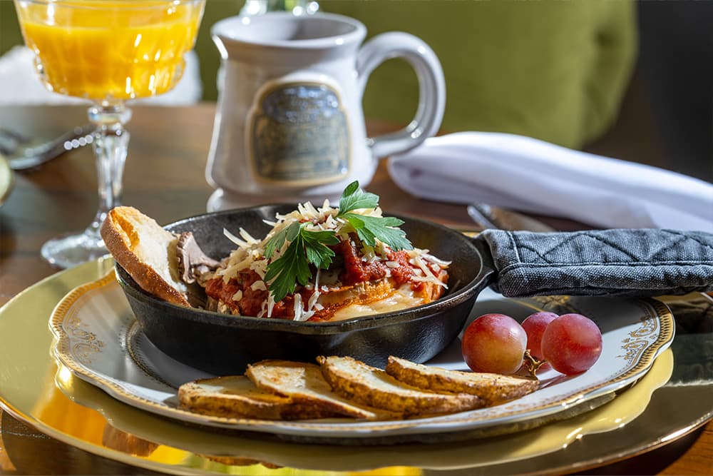 A delicious breakfast dish served in a cast iron skillet.